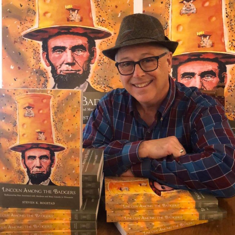 Author Steve Rogstad poses with one of his recent books