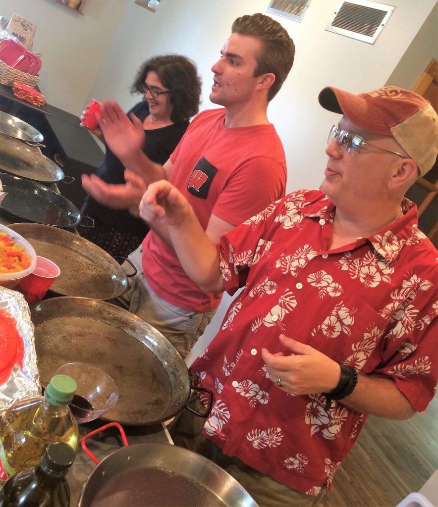 Outside of work, Tim enjoys cooking for 150 people at an annual family Paella Festival