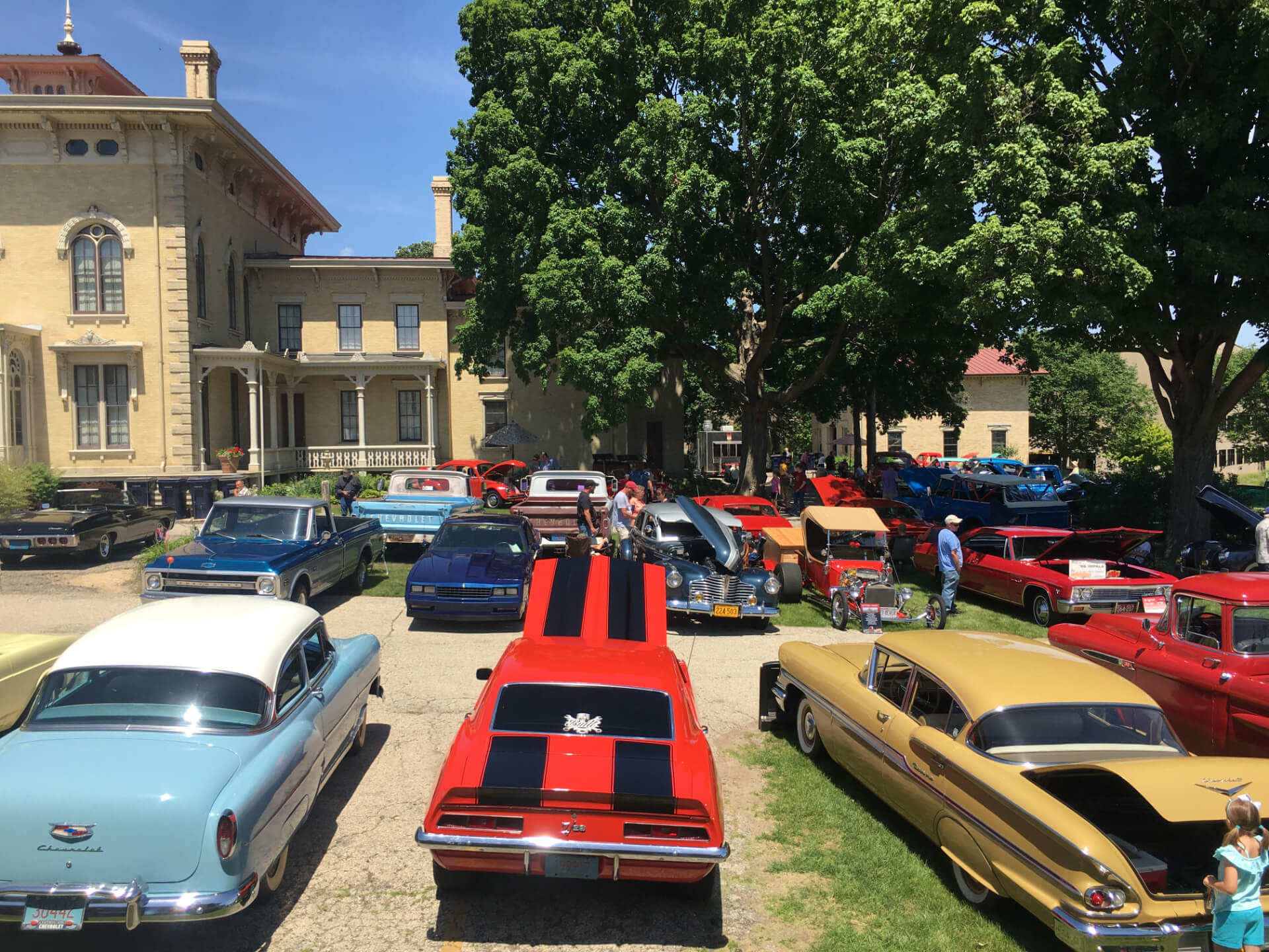 A view of several vintage cars on display at the Rock County Historical Society campus in Janesville, Wisconsin.